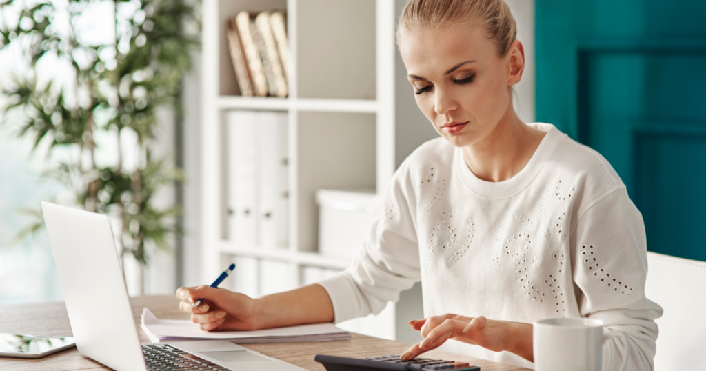 lady doing a budget at her computer